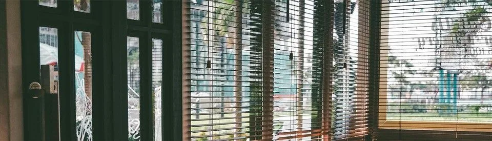 Hand crafted dark wooden venetian blinds fitted in Cupar by J-Blinds